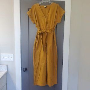 Straight leg mustard jumpsuit with bow and POCKETS!